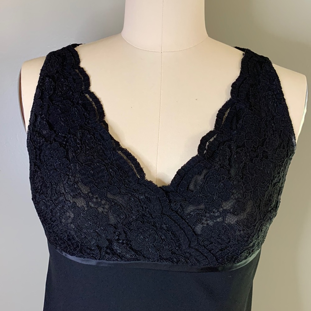 Sleeveless black fitted Dress Fully lined with lace at bodice. Empire waist line